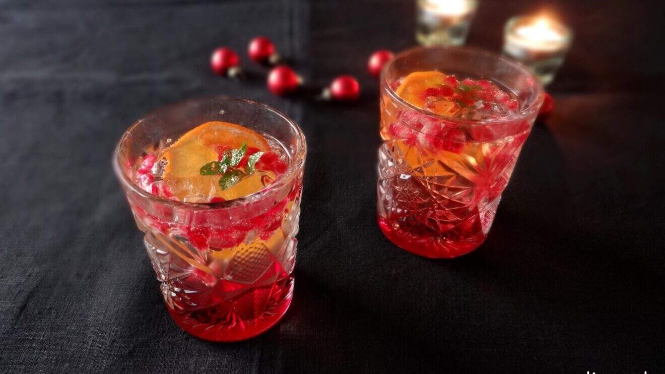 Champagnecocktail met granaatappel