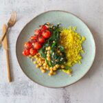 Kikkererwten met wilde spinazie en tomaatjes