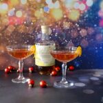 Cocktail met honingrum en granaatappel