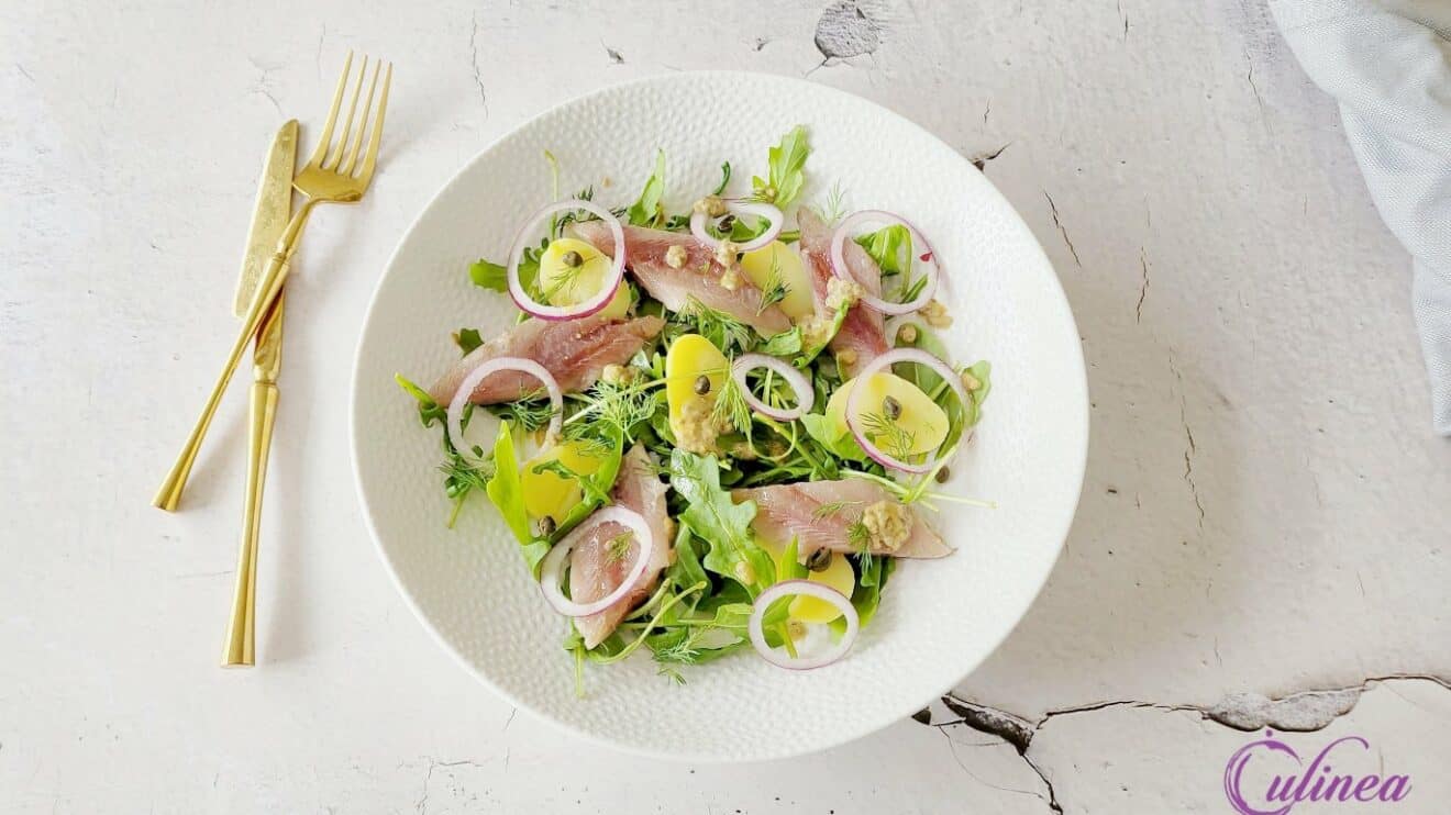 Haringsalade met aardappel en rucola