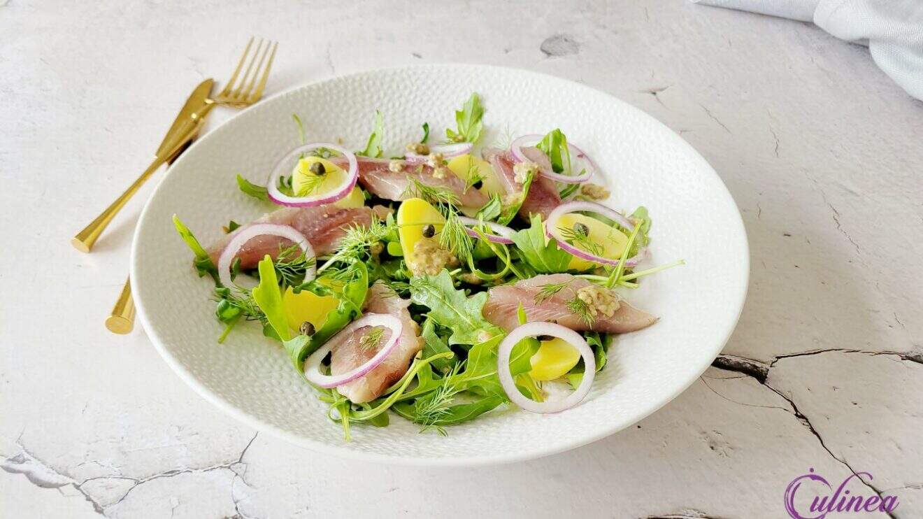 Haringsalade met aardappel en rucola